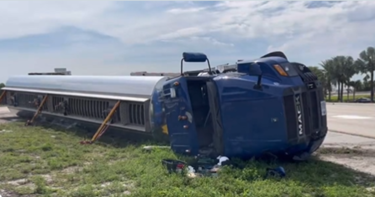 Overturned tanker truck success in tiny fuel spill, closure of I-595 lanes