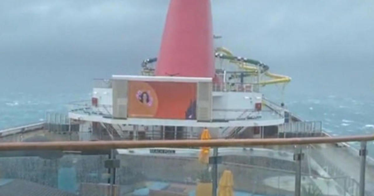 cruise ship battered by storm