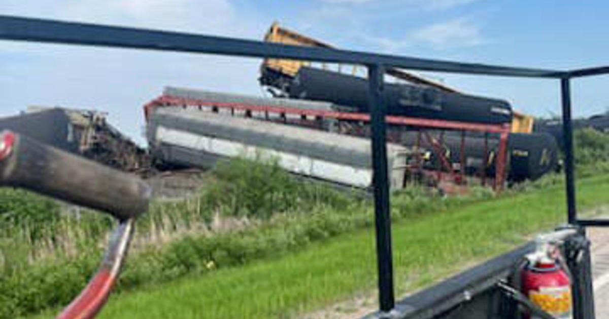 Crews clean up after two trains derail in Minnesota and North Dakota but no toxic chemicals spilled