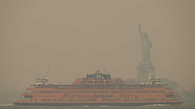 New York City skyline nearly disappears amid Canadian wildfire Air Quality Alert 