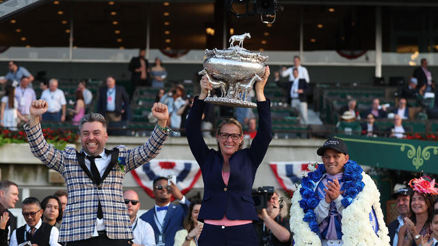 Trainer Jena Antonucci holds the winners trophy with owner Jon Ebbert (L) and Jockey Javier Castellano who rode riding Arcangelo to win the 155th running of the Belmont Stakes at Belmont Park on June 10, 2023 in Elmont, New York. 