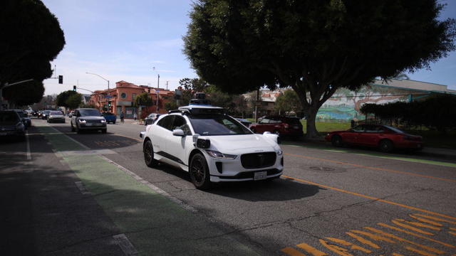 Self-driving Waymo cars on the road in Santa Monica 