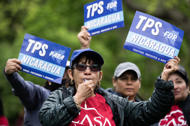 Demonstrators rally in Lafayette Park to demand Temporary Protected Status for Nicaragua, Honduras, Guatemala, and El Salvador on Monday, May 1, 2023. 
