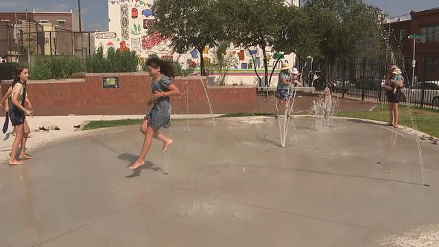 girl-jumping-on-new-splash-pad.jpg 