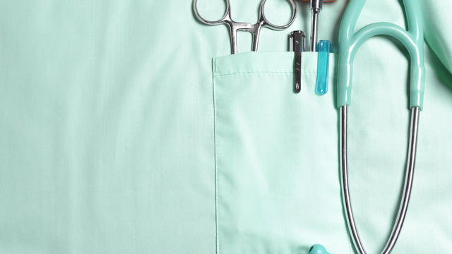 Doctors pockets with medical instruments. 