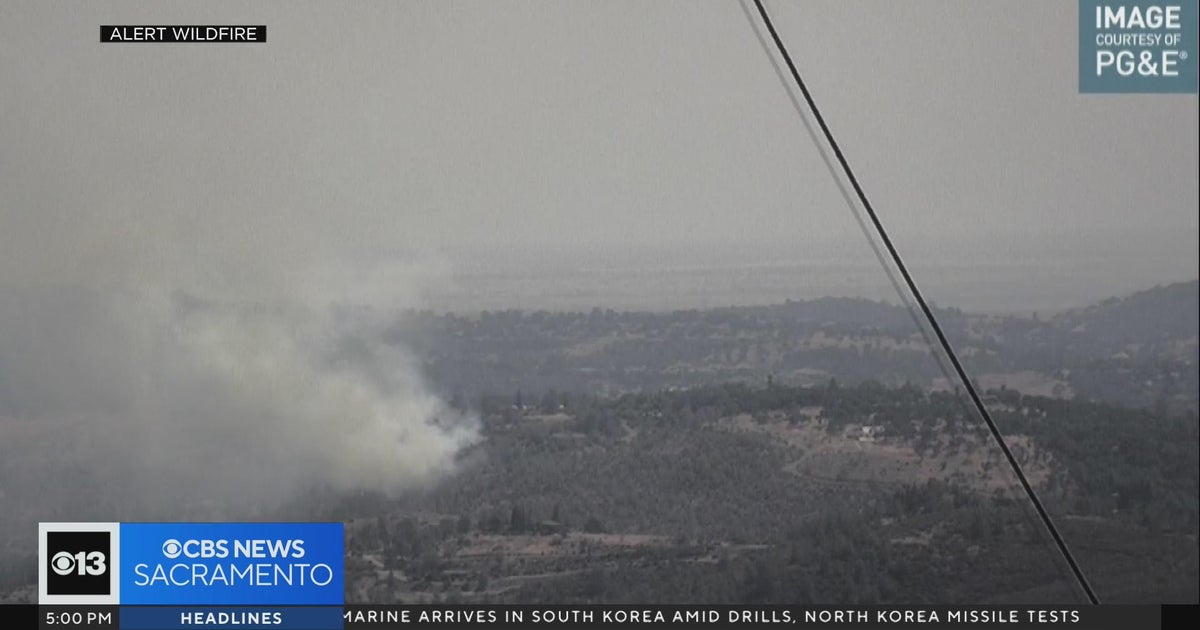 Firefighters battle brush fire in El Dorado County