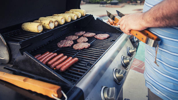 Close up of man grilling 