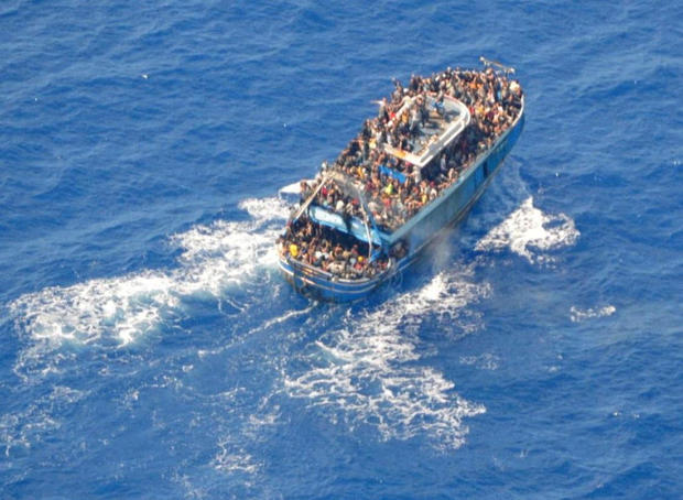 Aerial photo of migrants aboard a ship off the coast of Greece 