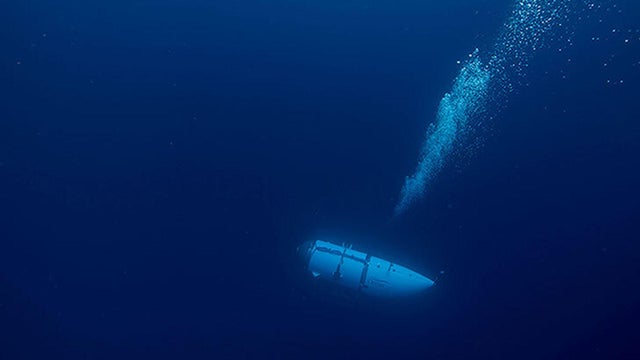 The Titan submersible, operated by OceanGate Expeditions to explore the wreckage of the sunken Titanic off the coast of Newfoundland, Canada, dives in an undated photograph. 