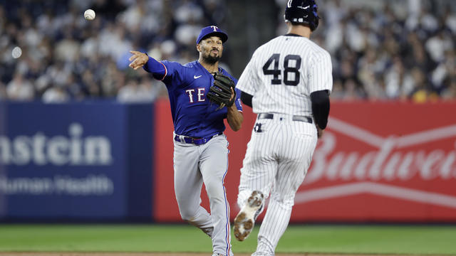 Marcus Semien #2 of the Texas Rangers completes a seventh inning ending double play after forcing out Anthony Rizzo #48 of the New York Yankees at Yankee Stadium on June 23, 2023 in the Bronx borough of New York City. 