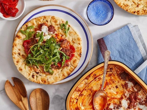 Oven-Baked Sausage & Mozzarella Pitas with Arugula & Roasted Red Peppers. 