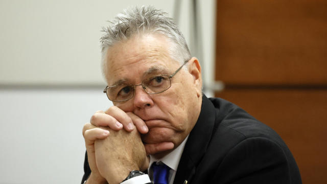 Scot Peterson, a former Marjory Stoneman Douglas High School school resource officer, is seen at the defense table during closing arguments in his trial at the Broward County Courthouse in Fort Lauderdale, Florida, on June 26, 2023. 