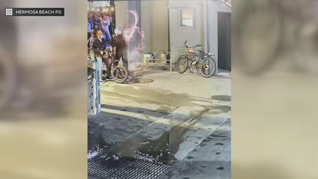 man-throws-firework-into-crowd-in-hermosa-beach.png 