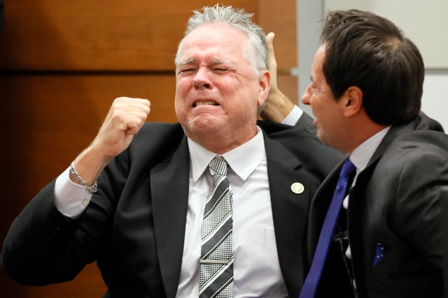 Scot Peterson, a former Marjory Stoneman Douglas High School school resource officer, reacts as he learns of his acquittal at the Broward County Courthouse in Fort Lauderdale, Fla., on June 29, 2023.