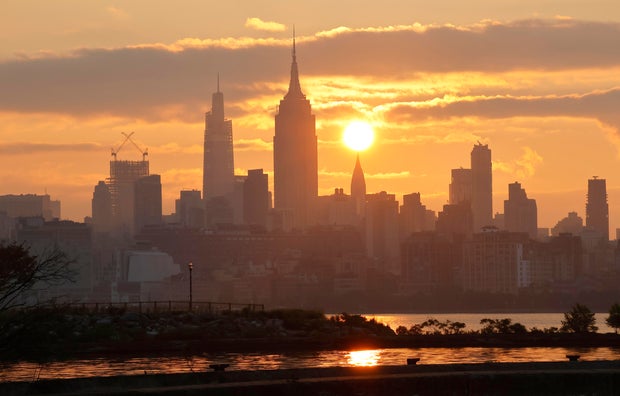 Smoke Shrouds the Midtown Manhattan Skyline at Sunrise in New York City