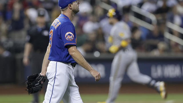 Max Scherzer #21 of the New York Mets looks on after surrendering a sixth inning two run home run against Victor Caratini #7 of the Milwaukee Brewers at Citi Field on June 29, 2023 in New York City. 