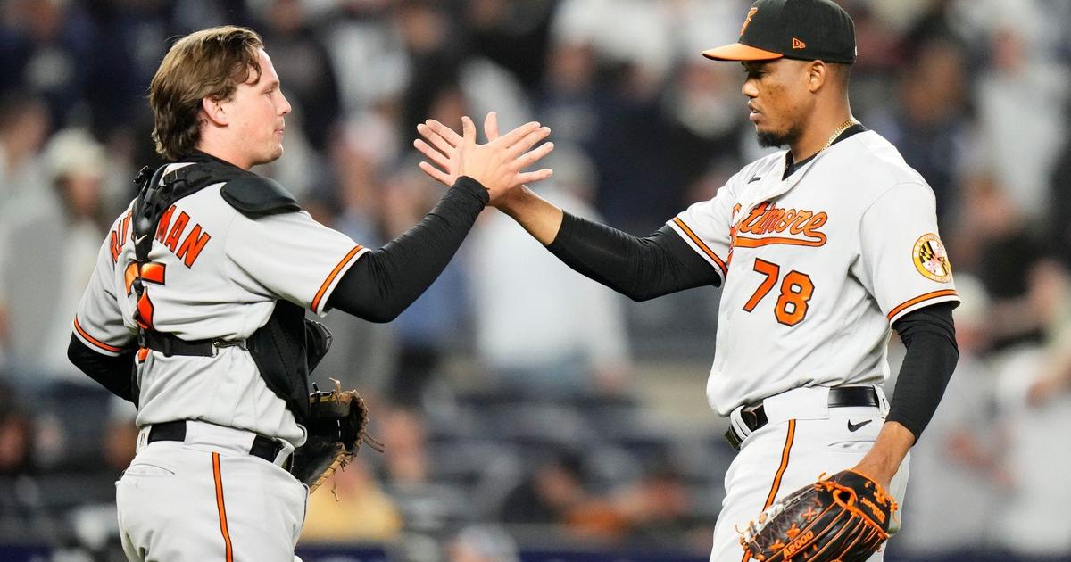 Orioles players Adley Rutschman, Félix Bautista, Yennier Cano