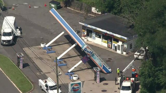 An aerial view over a gas station in North Plainfield. The canopy over the gas pumps has fallen over. 