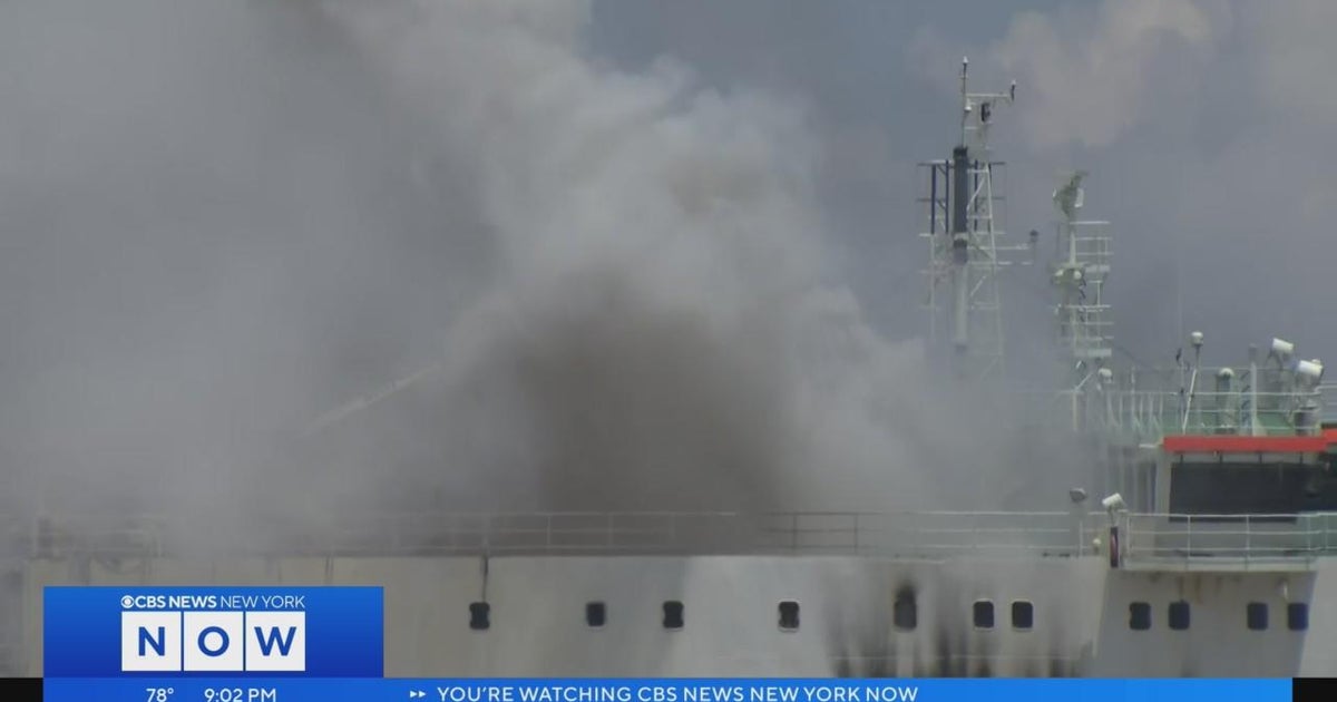 Cargo ship where 2 Newark firefighters died continues to burn - CBS New ...