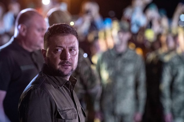 Ukraine says woman held in plot to assassinate President Volodymyr Zelenskyy as airstrikes kill 3