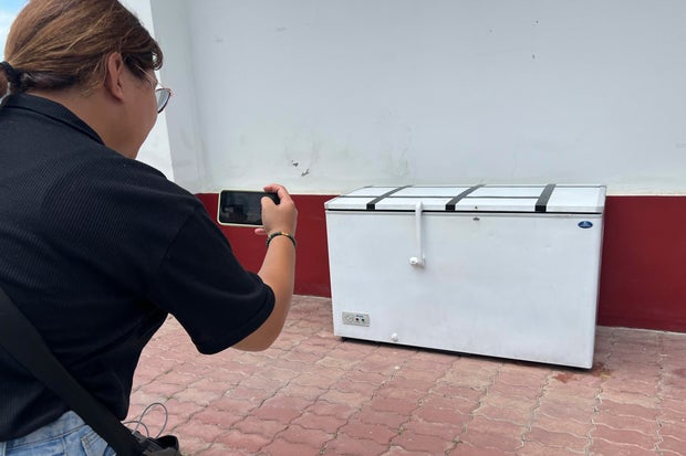 Missing businessman's dismembered body found in freezer with chainsaw and hedge clippers, Thai police say