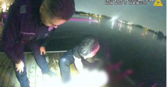 Dallas police officers save woman from car submerged in lake