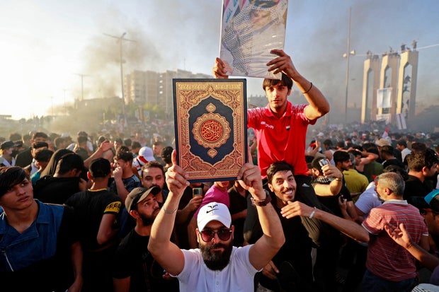Outrage over man who desecrated Quran prompts protesters to set Swedish Embassy in Iraq on fire