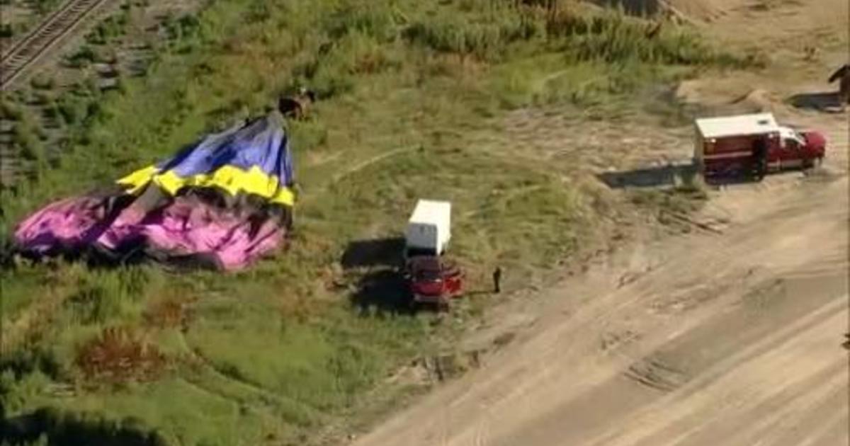 Man hospitalized after falling out of hot air balloon, police say