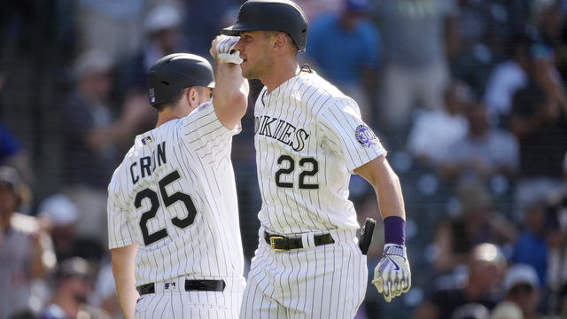 Colorado Rockies' C.J. Cron (25) reacts before the start of a