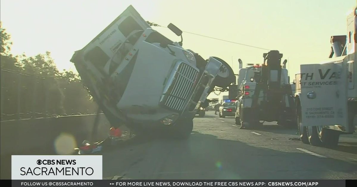 Crews upright overturned big rig causing big traffic backup on Yolo Causeway