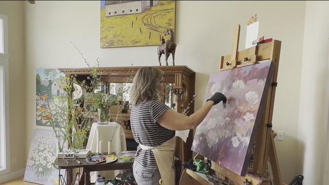 Kim Rhoney is a painter who draws inspiration from her home surrounded by farmland in Milan. 