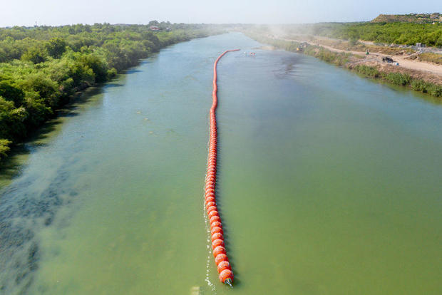 Buoy barriers are installed and situated in the middle of the Rio Grande river on July 18, 2023, in Eagle Pass, Texas. 