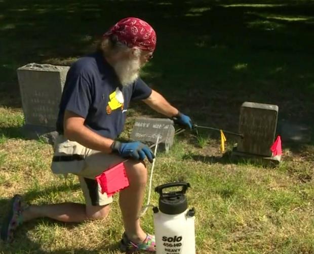 rene-amy-cleans-a-headstone.jpg 