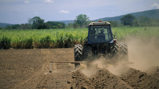 Tractor Plowing Soil 