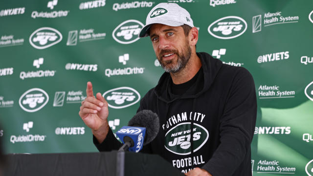 Quarterback Aaron Rodgers #8 of the New York Jets talks to reporters after training camp at Atlantic Health Jets Training Center on July 26, 2023 in Florham Park, New Jersey. 