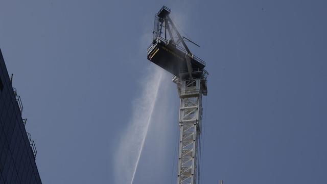 cbsn-fusion-crane-catches-fire-partially-collapses-high-above-new-york-city-thumbnail-2156619-640x360.jpg 