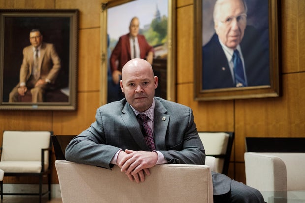 Teamsters' president Sean O'Brien in wood-paneled room