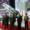 Kim Jong Un welcomes Russia, China envoys and shows off his missiles