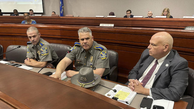 Connecticut Department of Emergency Services and Public Protection Commissioner James Rovella, right, appears with Colonel Stavros Mellekas, superintendent of the Connecticut State Police, center, and Lt. Colonel Mark Davison for a hearing on state troopers providing false traffic stop information on Wednesday, July 26, 2023 in Hartford, Conn. 