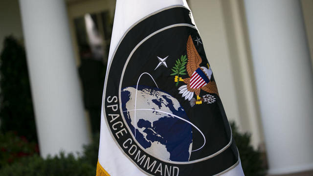 A U.S. Space Command flag is displayed during a ceremony in the Rose Garden of the White House on Thursday, Aug. 29, 2019. 
