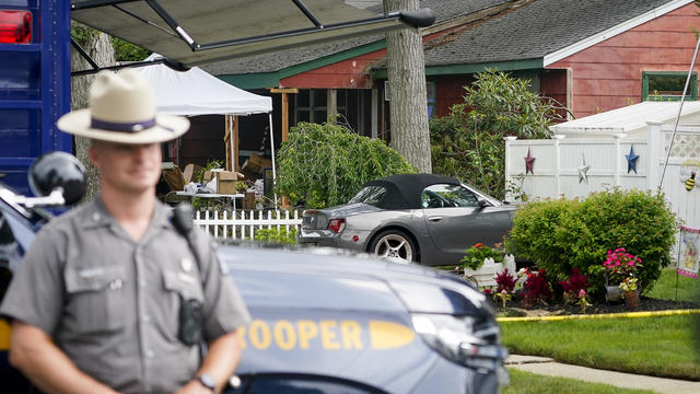 Investigator works in backyard of Long Island home of Gilgo Beach killings suspect 
