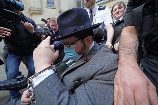 Nicholas Rossi, aka Nicolas Alahverdian, leaves the Edinburgh Sheriff Court after judge Norman McFadyen confirmed his identity as the man who has been fighting extradition to the U.S. on charges involving identity theft and fraud, and a 2008 sexual assault charge in Utah, November 11, 2022