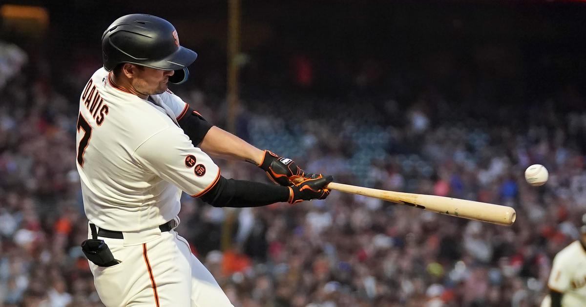 San Francisco Giants' J.D. Davis, right, is congratulated by Yermin Mercedes  (6) after hitting a home run during a baseball game against the Los Angeles  Dodgers in San Francisco, Thursday, Aug. 4