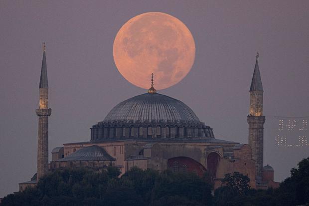 Full moon rises over Hagia Sophia Grand Mosque in Istanbul 