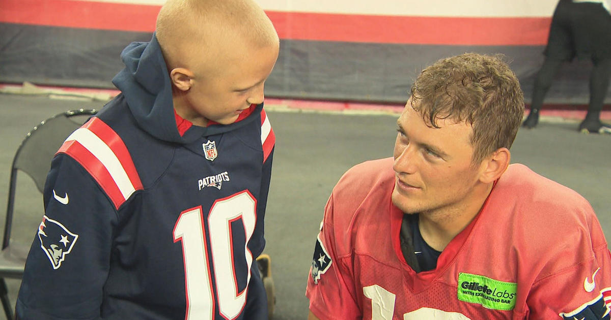 Mac Jones, boy who battled liver cancer share a moment