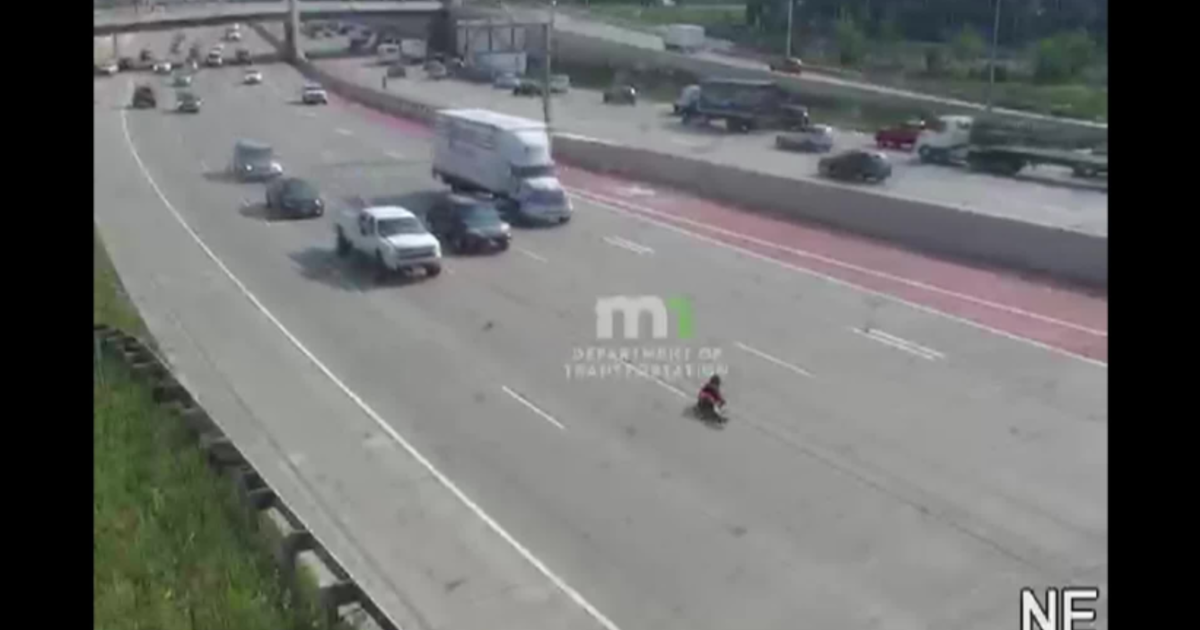 Motorcyclist walks away from dramatic crash on I-35W