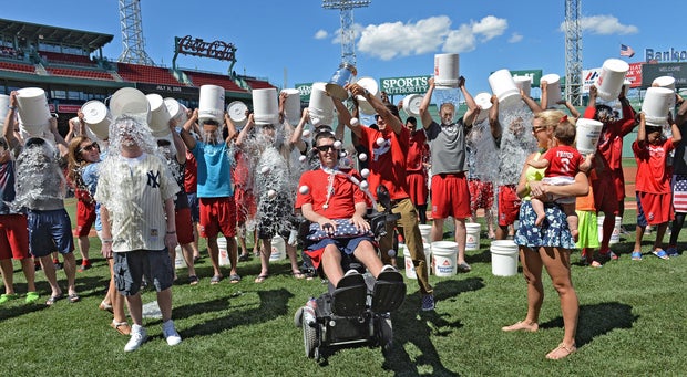 Ice Bucket Challenge at Fenway Park - players and staff doused with buckets of water to raise money for ALS research