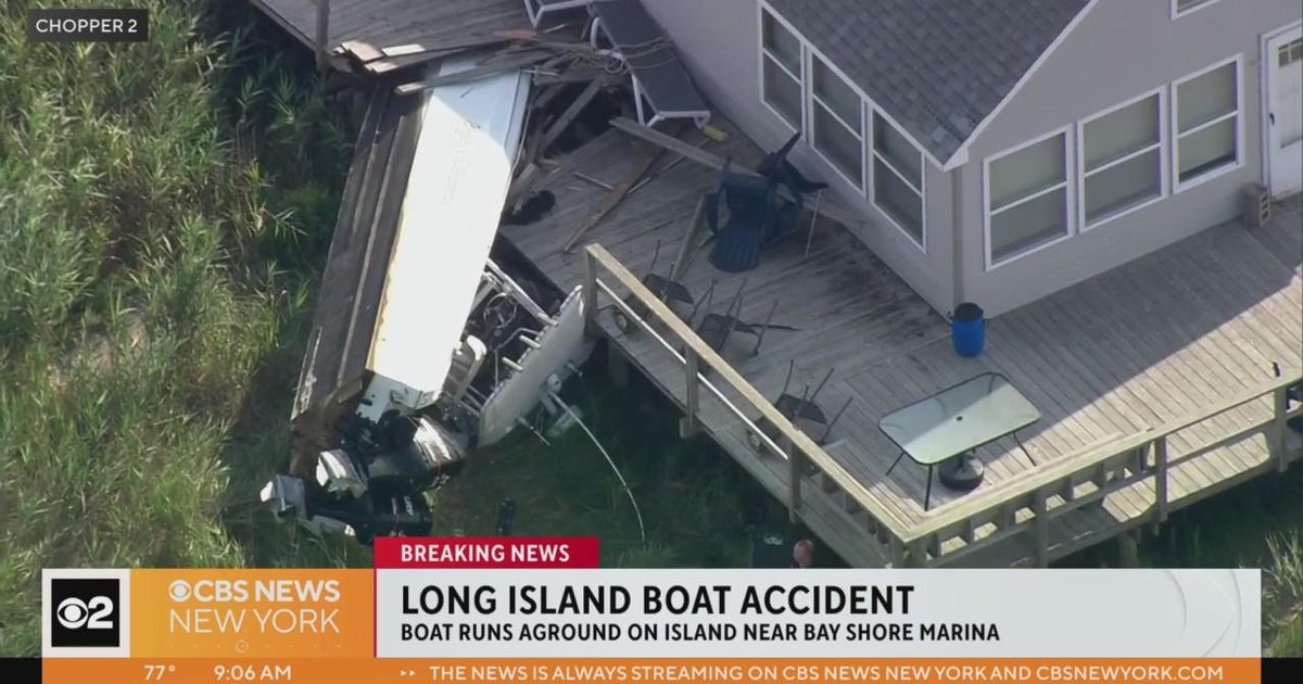 Boat crashes into home on island off Long Island - CBS New York