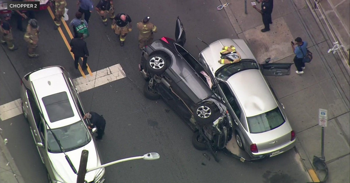2 injured when driver crashes into parked car in Jersey City CBS New York