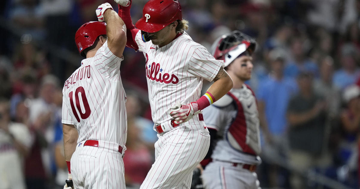 J.T. Realmuto crushes a two-run homer to seal the Phillies' 6-1 victory  over the Diamondbacks in Game 5 of the NLCS
